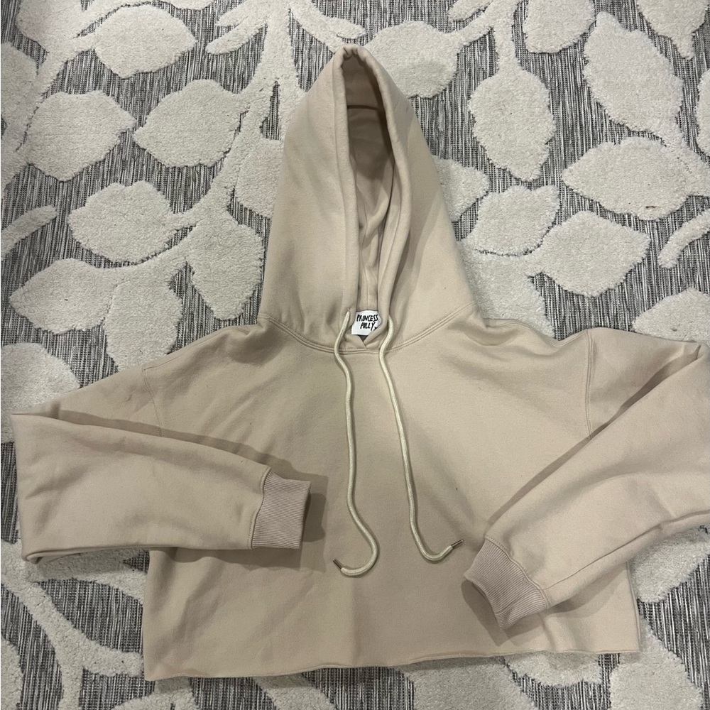 NWOT, cropped cream colored hoodie.
